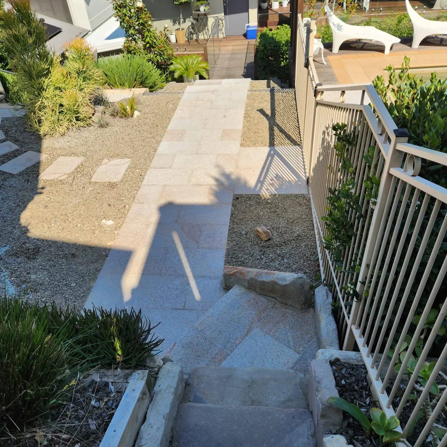 Garden pathway with stepping stones and native planting